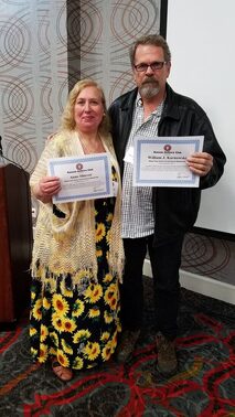 Image of Anne Shiever and William Karnowski with 15 year membership certificates.